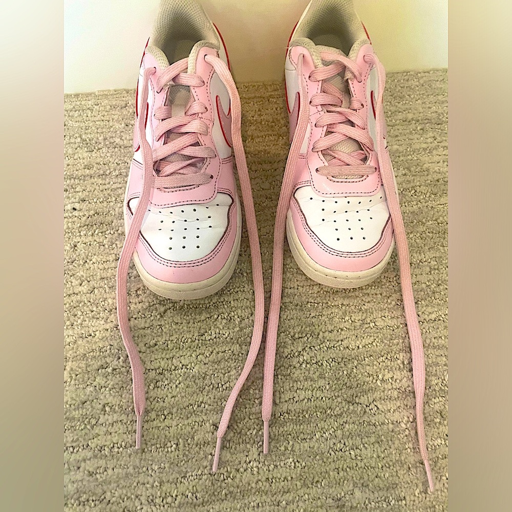 Cute pastel pink NIKE court shoes! Perfect when you’re on the go! Size: Kids 3.5